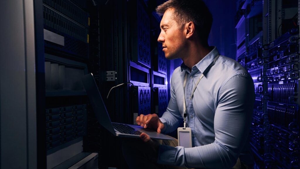 Man Works In Colocation Data Center